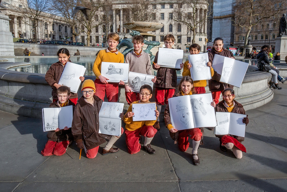 Hill House School pupils show off their artwork in Trafalgar Square